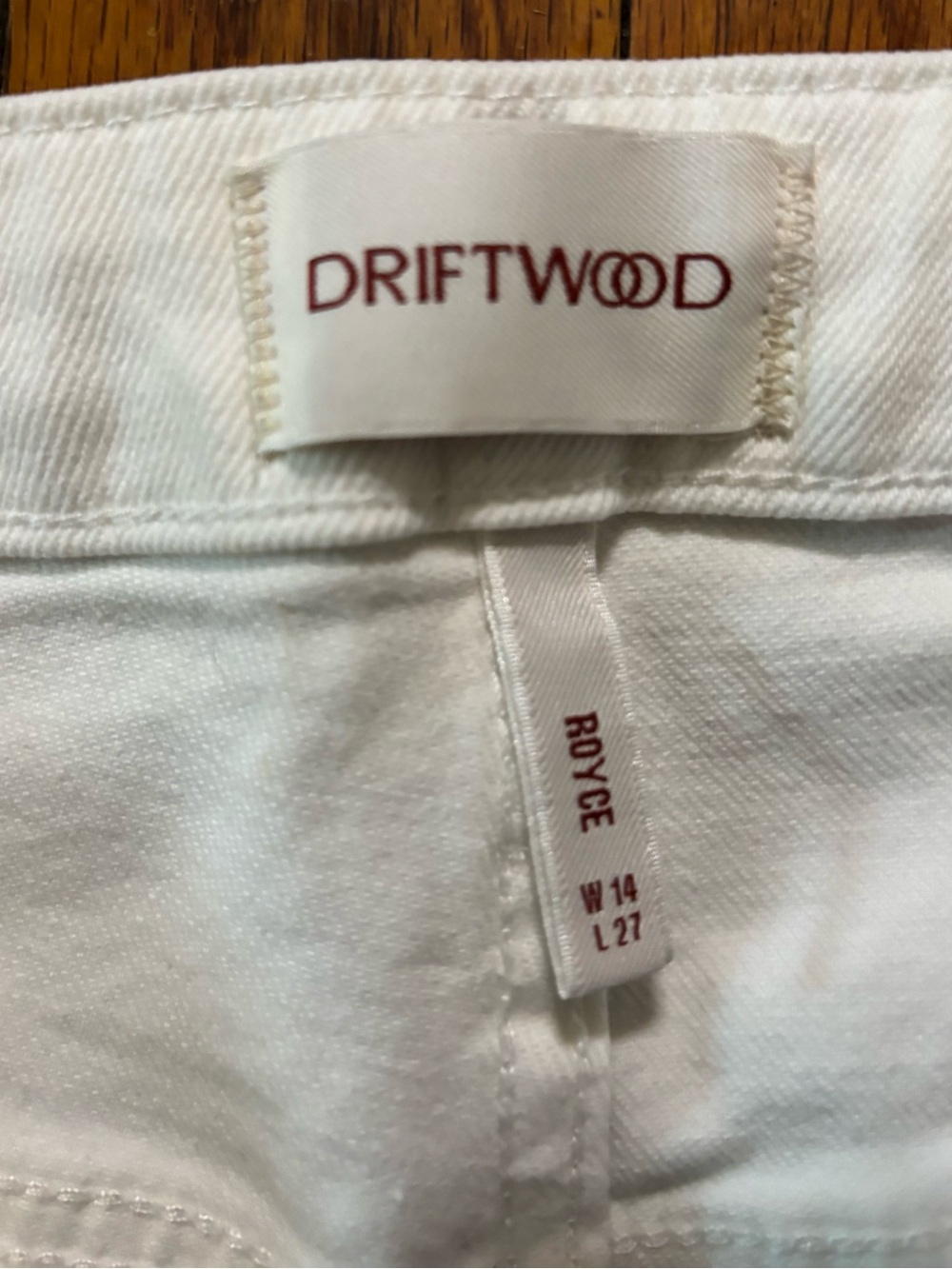 DRIFTWOOD Royce White Denim Jeans with Cutout Flowers at the Hem